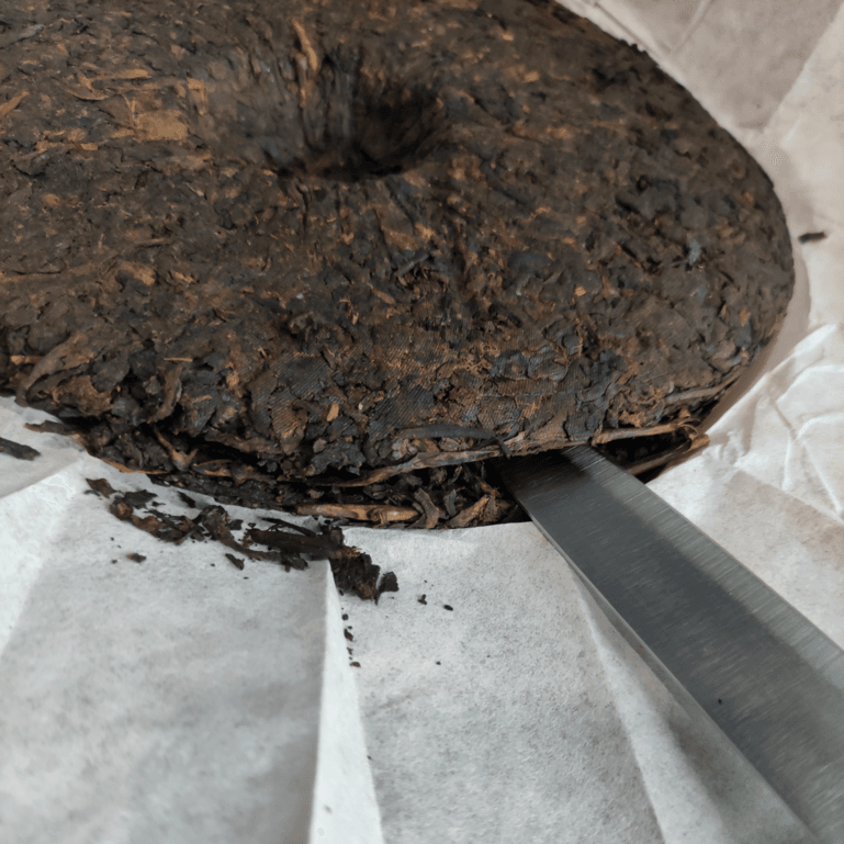 Té prensado o Cake tea Pu-erh como se abre un te prensado chino